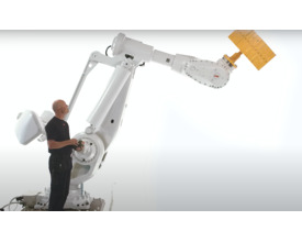 The ABB IRB 8700, paired with a human for scale, demonstrates the future of industrial robotics. The ABB IRB 8700, paired with a human for scale, demonstrates the future of industrial robotics.